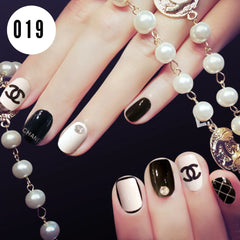 BLACK WHITE SHORT NAILS