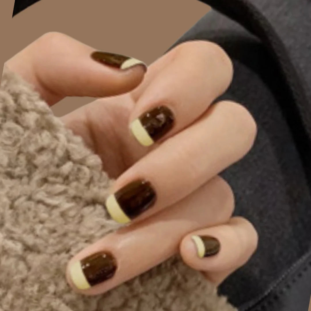 YELLOW TIP BROWN NAILS