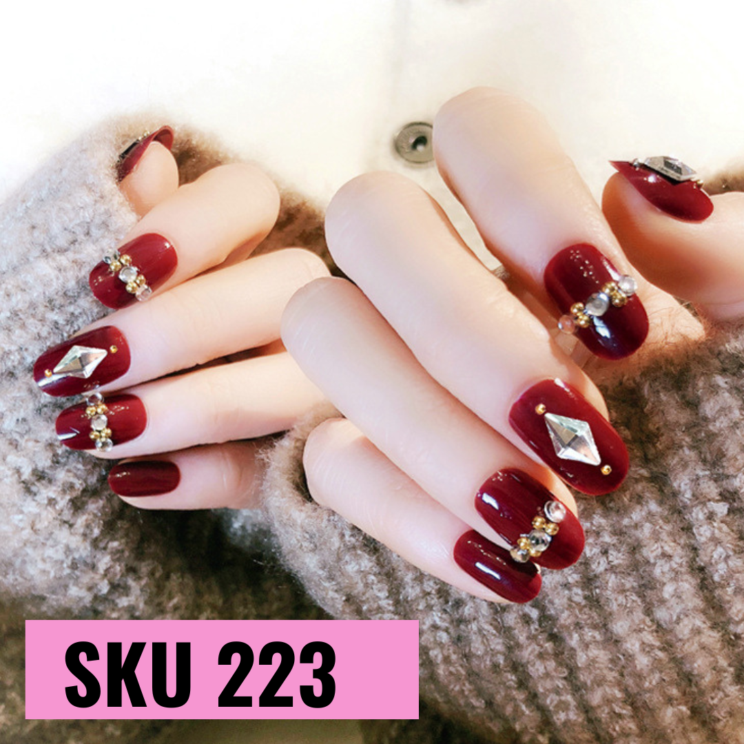 Maroon lv nails – Nail Queen Pakistan